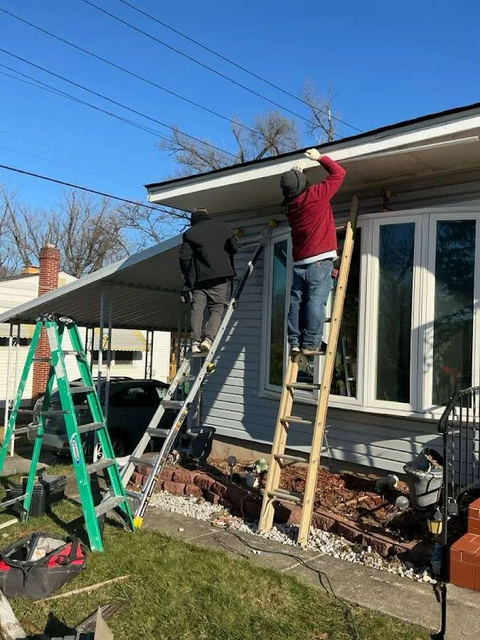 Restoration crew performing exterior repair in Uxbridge